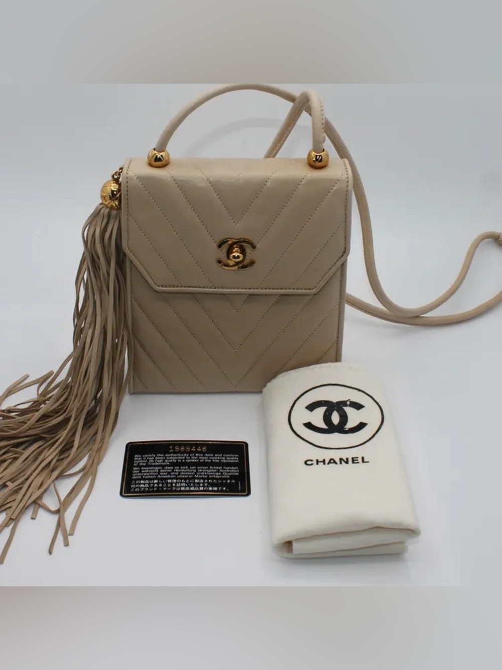 Chanel Vintage Chevron Quilted Tassel Top Handle Bag (V-Stitch) Quilted Lambskin